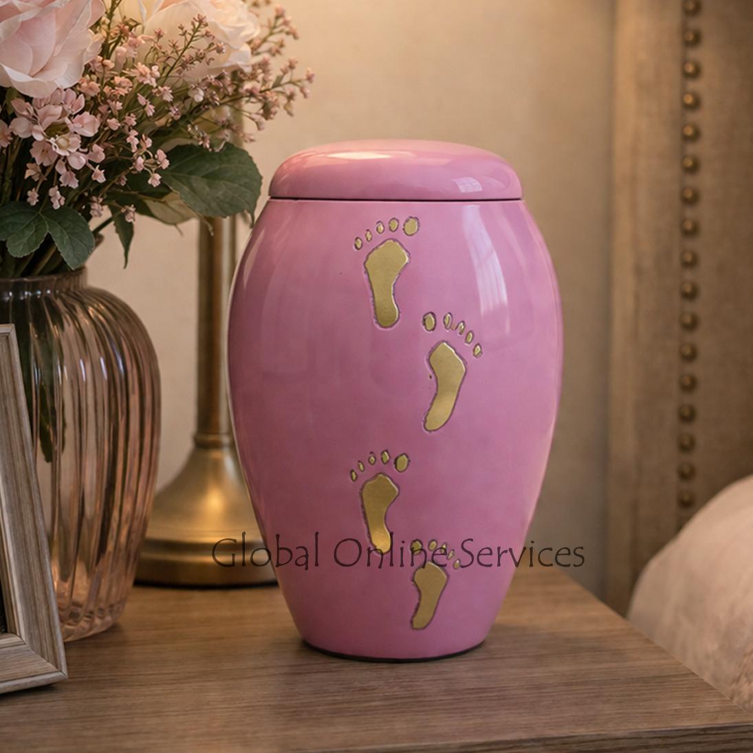Baby Paw Prints on Sutton Brass Pink Baby Memorial Urn for Ashes.