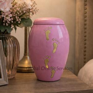 Baby Paw Prints on Sutton Brass Pink Baby Memorial Urn for Ashes.